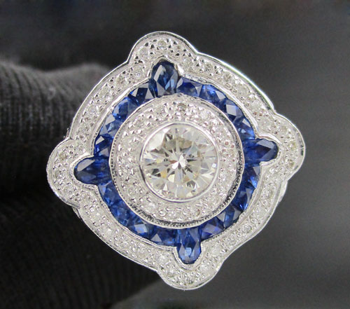 แหวน เพชรเดี่ยว 0.40 กะรัต ล้อมไพลิน Princess เพชร 48 เม็ด 0.24 กะรัต ทอง18Kขาว งานสวยมาก นน. 3.94 g