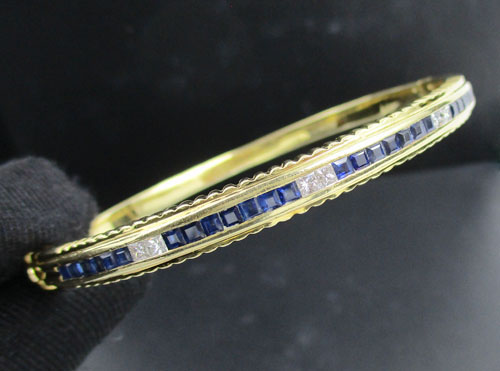 กำไล ไพลินแถว คั่นเพชร Princess 6 เม็ด 0.30 กะรัต ทอง18K หลุดจำนำ นน. 20.46 g