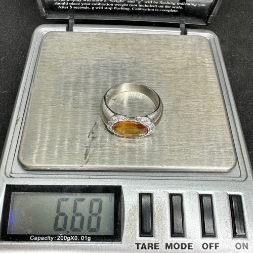แหวน บุษราคัม บางกะจะ 2.35 กะรัต ฝังเพชร 14 เม็ด 0.28 กะรัต ทอง90ชุบขาว นน. 6.68 g 8