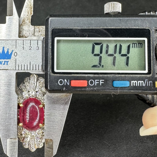 แหวน ทับทิม หลังเบี้ย ฝังทับทิม เจียร ล้อมเพชร 62 เม็ด 0.90 กะรัต ทอง90 ขนาด 55 นน. 11.78 g 6