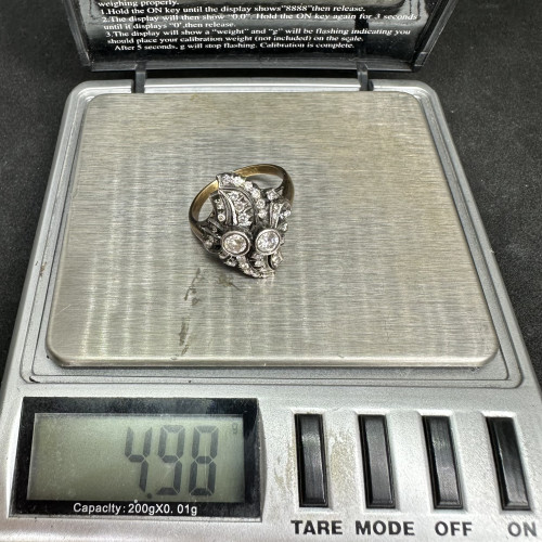 แหวน เพชรทรงมาคีย์ 2 เม็ด 0.26 กะรัต ฝังเพชรกุหลาบ 34 เม็ด 0.44 กะรัต ทองK 2 สี หลุดจำนำ นน. 4.98 g 8