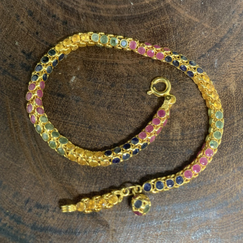 สร้อยข้อมือ พลอยหลายสี ลายกระดูกงู ทับทิม ไพลิน เขียวส่อง บุษราคัม รอบเส้น ทอง18K ยาว 19 ซม. นน. 7.7