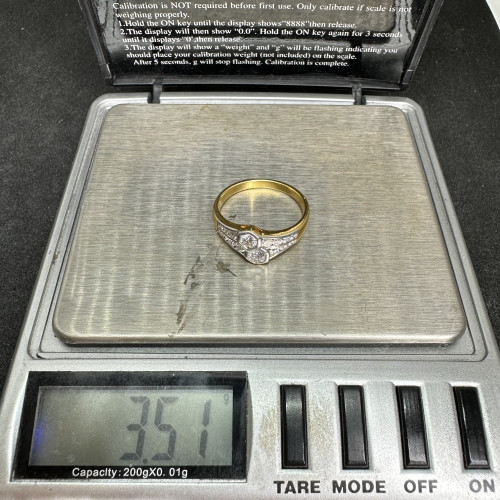 แหวน เพชรแถวไขว้ 2 เม็ด 0.30 กะรัต ฝังเพชร 14 เม็ด 0.40 กะรัต ทอง18K นน. 3.51 g 9