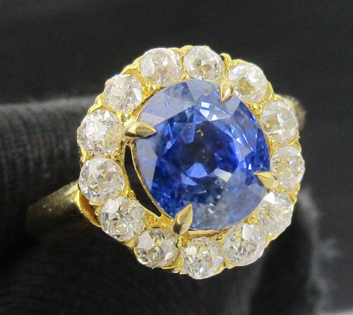 แหวน ไพลิน มาดากัสกา เจียร ล้อมเพชร 13 เม็ด 0.96 กะรัต ทอง90 งานสวยมาก นน. 5.48 g
