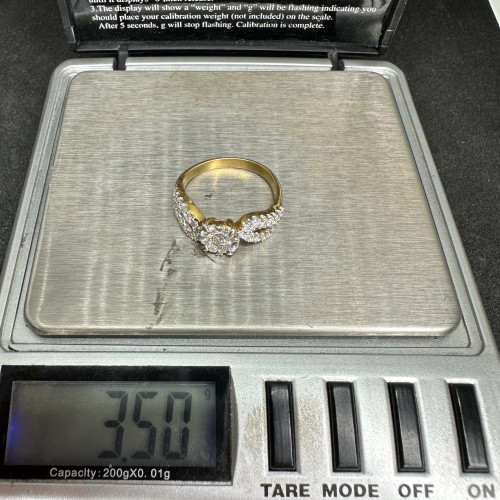 แหวน เพชรกระจุกพิกุล 9 เม็ด 0.34 กะรัต ฝังเพชร 28 เม็ด 0.28 กะรัต ทอง90 นน. 3.50 g 8