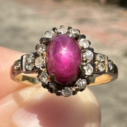 แหวน ทับทิม พม่า ล้อมเพชรกุหลาบ 18 เม็ด 0.10 กะรัต ทอง14K ขนาด 46.5 นน. 1.65 g