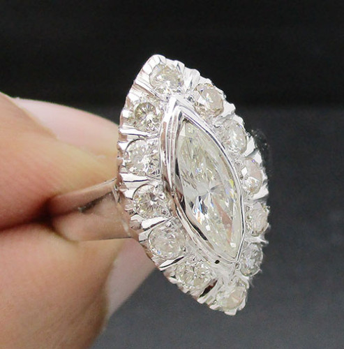 แหวน เพชร ทรงมาคีย์ 0.56 กะรัต ล้อมเพชร 12 เม็ด 0.60 กะรัต ทอง90 ชุบขาว งานสวยมาก นน. 5.59 g