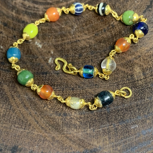 สร้อยข้อมือ หินทวารวดี 5.5 มิล รอบเส้น ทอง90 ความยาว 18 ซม. นน. 6.00 g