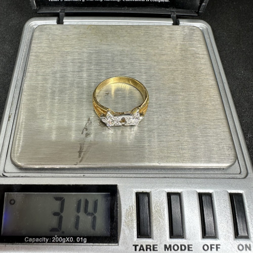 แหวน เพชร ลายดาว 2 เม็ด 0.26 กะรัต ฝังเพชรกุหลาบ 10 เม็ด 0.15 กะรัต ทองK 2 สี นน. 3.14 g 8