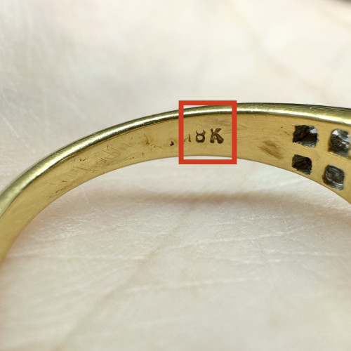 แหวน เพชรแถวไขว้ 2 เม็ด 0.30 กะรัต ฝังเพชร 14 เม็ด 0.40 กะรัต ทอง18K นน. 3.51 g 5