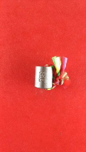 ตะกรุดโลกธาตุจารมือมีโค๊ต ร้อยไหม7สี