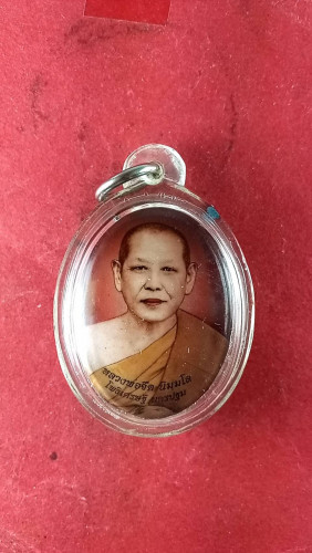 ล็อกเก็ตครึ่งองค์สีแดงหลังอุดตัวต่อตะกรุดเงิน2 ดอกจารมือ 