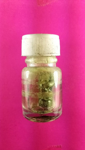 กุมารทองกวักเงินกวักทองในน้ำมันจันทร์รุ่น1 