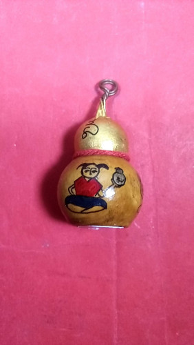 จ้ำเต้าดูดทรัพย์กุมารทองใต้รูปถ่าย 