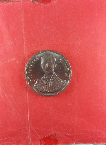 เหรียญเก้าเหลี่บมรัชกาลที่9 หลังภปร.ปี 31 