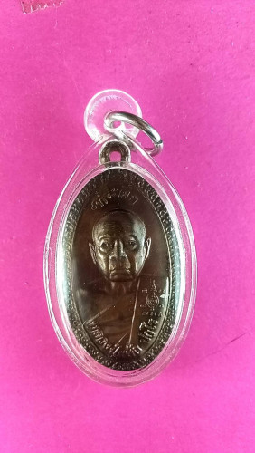 เหรียญใบขี้เหล็กนวะครึ่งองค์วัดรางหม้นปี56หมายเลข0101สวยมาก