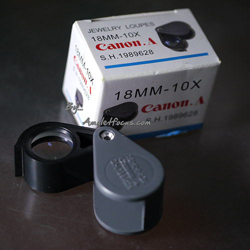 กล้องส่องพระ ยี่ห้อ Canon รุ่น  A.SH1989628 ขนาด 18 มิลลิเมตร กำลังขยาย 10 เท่า 2