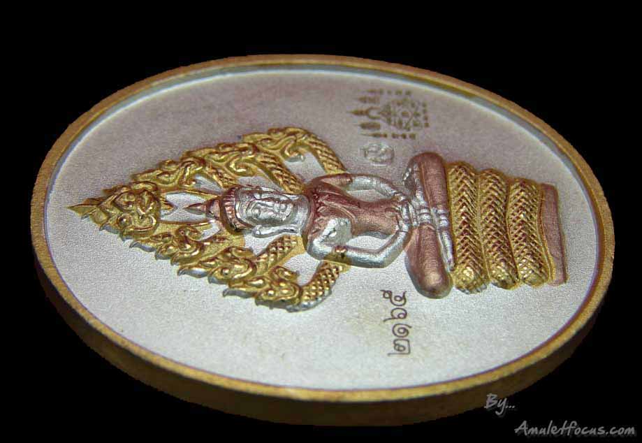 เหรียญนาคปรกไตรมาส หลวงพ่อสาคร พิมพ์ใหญ่ เนื้อสามกษัตริย์ ออกวัดหนองกรับ ปี 2551 หมายเลข 2165 3