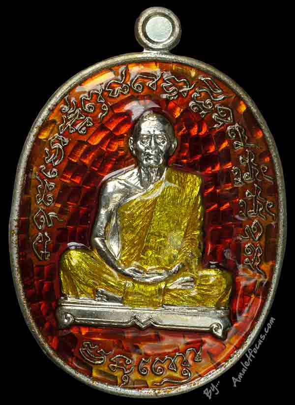 เหรียญไตรมาสเจริญพร{รุ่นประสบการณ์ฟ้าผ่า} หลวงพ่อสาคร ออกวัดหนองกรับ ปี ๕๕ เนื้อเงินลงยา หมายเลข ๓๓๖ 1