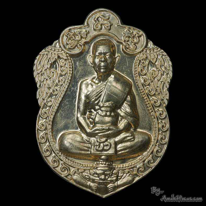 เหรียญเสมาสร้างโรงพยาบาลตราด หลวงปู่บัว ถามโก เนื้ออัลปาก้า บล็อคทองคำ สังฆาฏิ ๒ ขีด ออกปี ๒๕๕๔