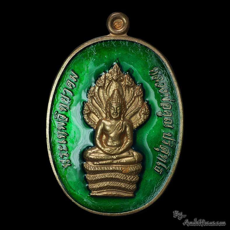 เหรียญพิมพ์นาคปรก หลวงพ่อคูณ รุ่น สร้างกุฏิสงฆ์ วัดราษฏร์บำรุง (วัดปรก) นวะลงยาสีเขียว หมายเลข ๘๓