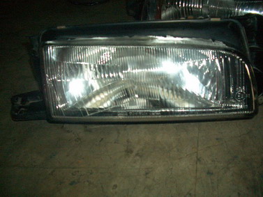 ไฟหน้า มาสด้า ซีดาน 92  Mazda