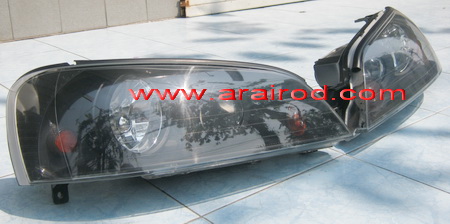 FORD LASER TIERRA ฟอร์ด เลเซอร์ เทียร่า ไฟหน้าโคมดำ 1