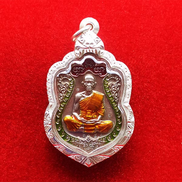 เหรียญเสมา หลังยันต์ รุ่นมนต์มหากาฬ หลวงพ่อคูณ วัดบ้านไร่ เนื้ออัลปาก้าลงยา 2 สี ปี 2557 1