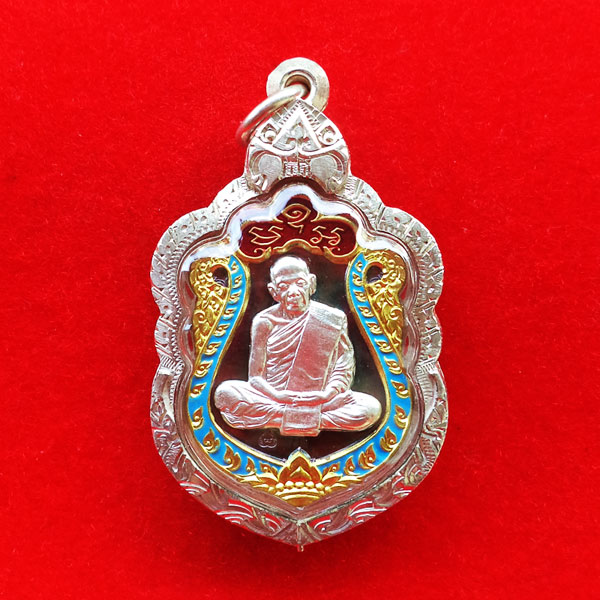 เหรียญหลวงปู่ทิม รุ่นมหาบารมี ๕๙  เนื้อทองแดงมันผิวรุ้ง หน้ากากเงิน ขอบปลอกลูกปืนลงยา 2 สี 1