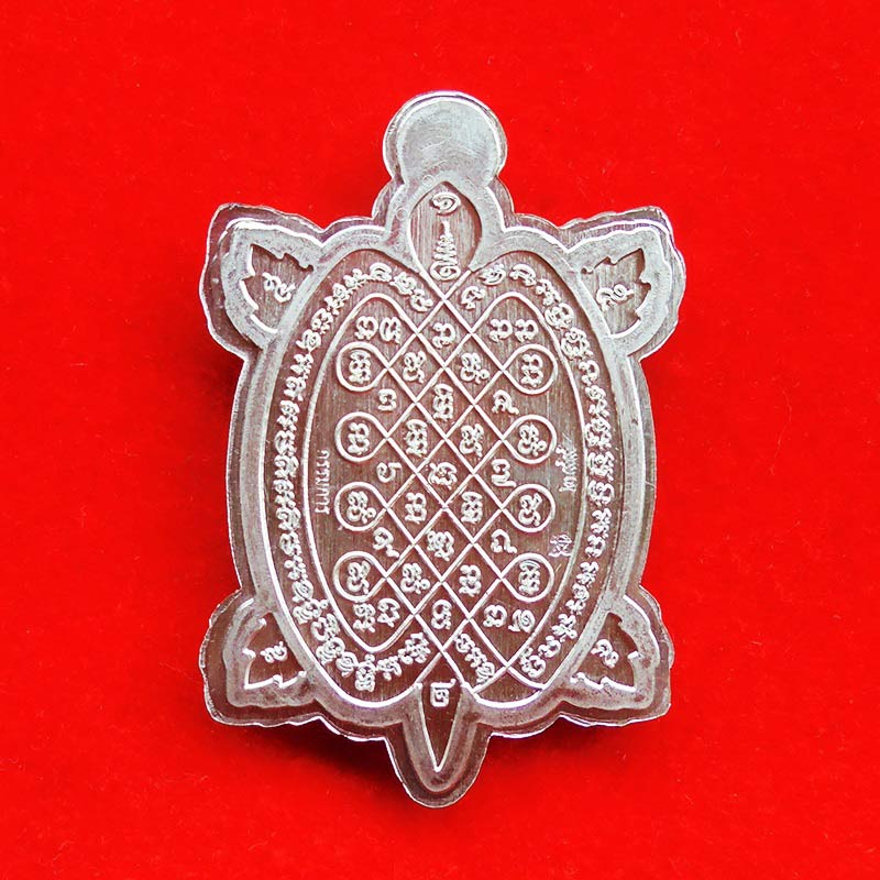 เหรียญพญาเต่าเรือน จักรพรรดิ์รวยพันล้าน รุ่น 1 หลวงปู่ต๋อย เนื้ออัลปาก้าไม่ตัดปีกลงยาธงชาติ เลข 299 2