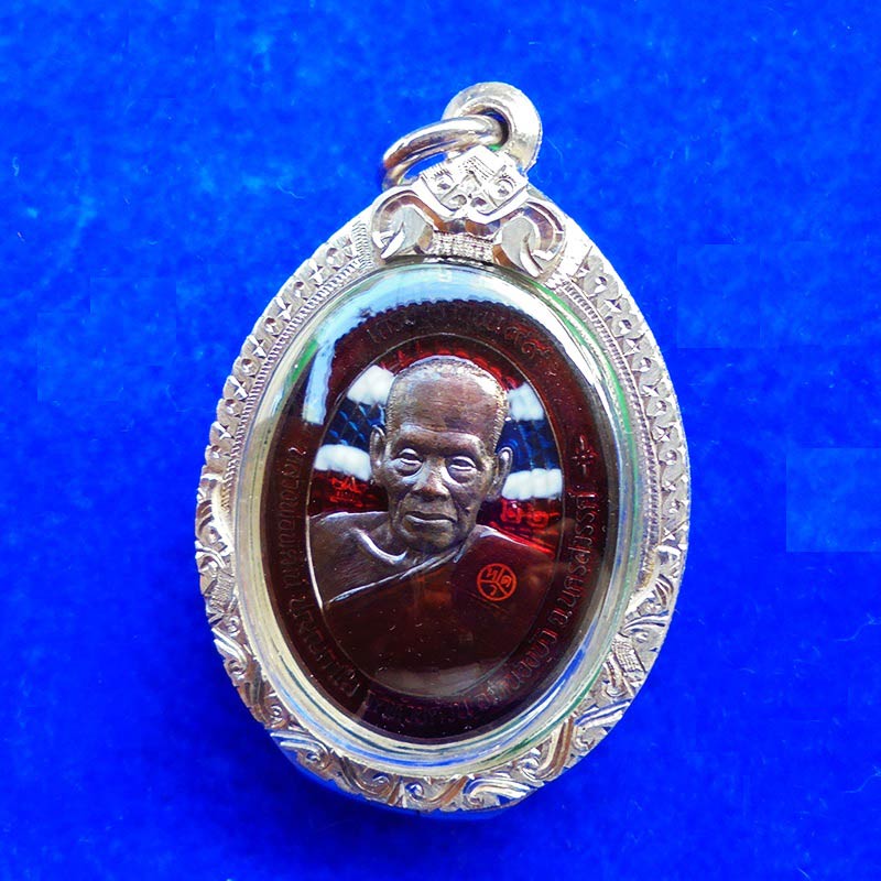 เหรียญหลวงพ่อพัฒน์ วัดห้วยด้วน รุ่นเศรษฐีอายุยืน 99 เนื้อนวะลงยาธงชาติ ปี 2563 ตลับเงิน