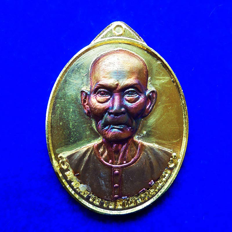 เหรียญแปะโรงสี โง้วกิมโคย รุ่นมหาเศรษฐี วัดวิมุตยาราม บางพลัด กรุงเทพฯ เนื้อทองทิพย์หน้ากาก เลข 121