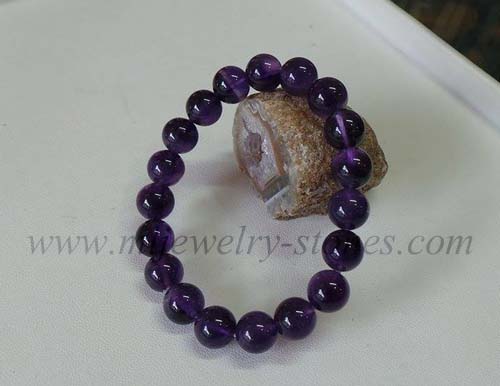 สร้อยข้อมืออเมทิสต์สีม่วงเข้มสีดีที่สุดสวยมากหรือเรียกกันว่าสีดอกตะแบก เจียรนัยทรงกลม ขนาด 10 มิล 1