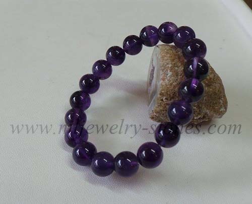 สร้อยข้อมืออเมทิสต์สีม่วงเข้มสีดีที่สุดสวยมากหรือเรียกกันว่าสีดอกตะแบก เจียรนัยทรงกลม ขนาด 10 มิล 2