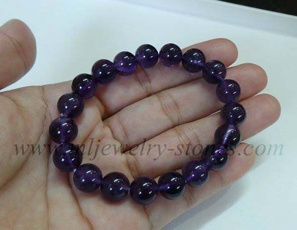 สร้อยข้อมืออเมทิสต์สีม่วงเข้มสีดีที่สุดสวยมากหรือเรียกกันว่าสีดอกตะแบก เจียรนัยทรงกลม ขนาด 10 มิล 5