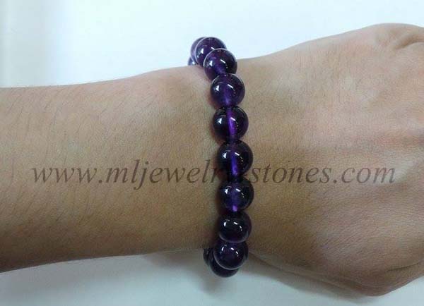 สร้อยข้อมืออเมทิสต์สีม่วงเข้มสีดีที่สุดสวยมากหรือเรียกกันว่าสีดอกตะแบก เจียรนัยทรงกลม ขนาด 10 มิล 6