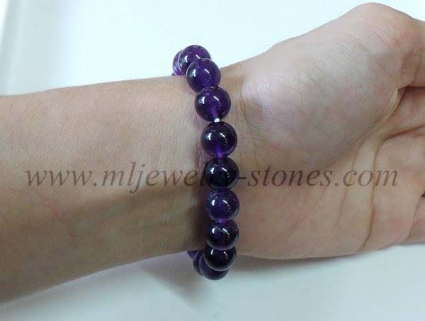 สร้อยข้อมืออเมทิสต์สีม่วงเข้มสีดีที่สุดสวยมากหรือเรียกกันว่าสีดอกตะแบก เจียรนัยทรงกลม ขนาด 10 มิล 7