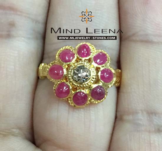 แหวนทองเพชรซีกล้อมทับทิมโบราณ  ล้อมด้วยทับทิม 8 เม็ด  เพชรซีกลูกโลกเม็ดชู 1 เม็ด น้ำหนักแหวนรวม 4.02