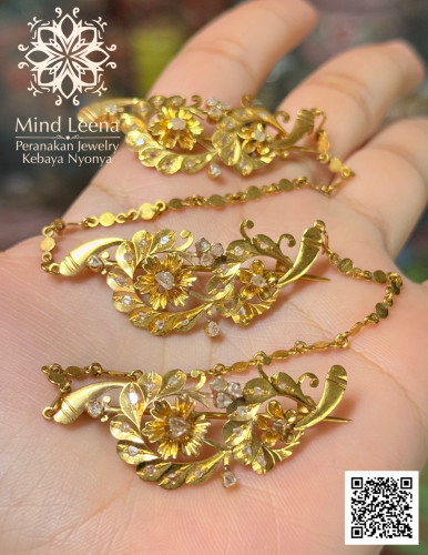 เข็มกลัดกอรอสังเพชรซีกโบราณ