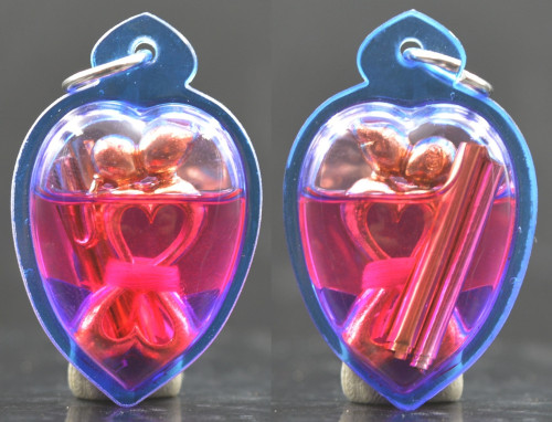  อิ้นคู่สุดสวาท เลี่ยมด้วยน้ำมันว่านเสน่ห์สาวหลง เนื้อทองเหลือง หลวงตารวม วัดโคกสำราญ 2561