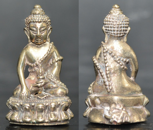 พระกริ่ง เนื้ออัลปาก้า รุ่นรวยเงินทอง หลวงปู่ช้าง สำนักสงฆ์หนองยายเม้า 2552