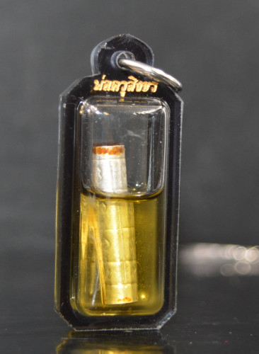 ตะกรุดพญานาหมื่น เนื้อเงินเลี่ยมน้ำมันสามตัณหา พ่อครูสิงขร เครือแดง 2568