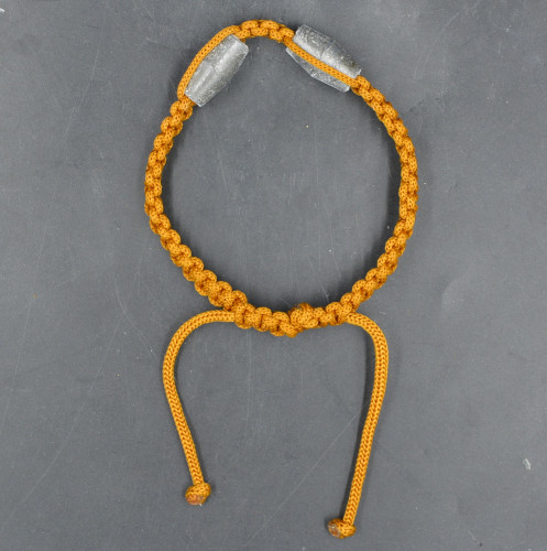 ตะกรุดข้อมือนวหรคุณ รุ่นนะมหามงคลบารมี 87 ทั่วทิศ หลวงปู่แขก วัดสุนทรประดิษฐ์ 2552