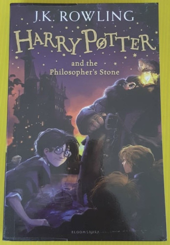 HARRY POTTER and the Philosopher's Stone by J.K. ROWLING