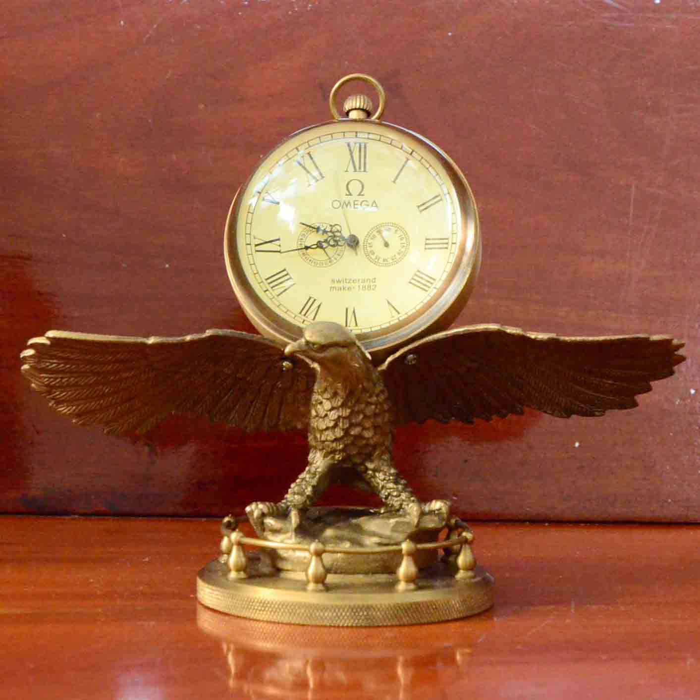 นาฬิกาตั้งโต๊ะทองเหลืองรูปนกอินทรีย์งานเก่า OMEGA Switzerand make-1882