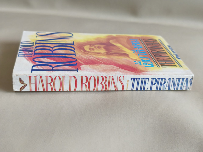 เขี้ยวสังคม (The Piranhas) ผลงานของ ฮาโรลด์ รอบบิ้นส์ (Harold Robbins) แปลโดย สุวิทย์ ขาวปลอด 2