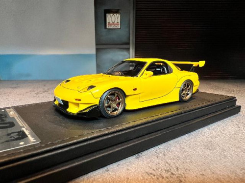 IG2869 1:43 INITIAL D Mazda RX-7 (FD3S) Yellow [Width 5 Length 10 Height 3 cms]  