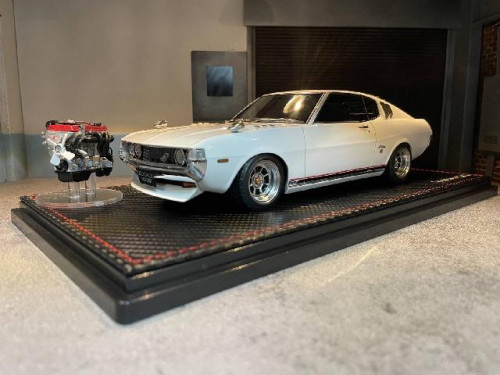 Ignition:IG2605 1:18 Toyota Celica 1600GT LB(TA27)Whi With Enginr [Width 10 Length 25 Height 7 cms] 