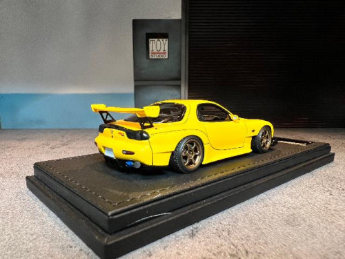 IG2869 1:43 INITIAL D Mazda RX-7 (FD3S) Yellow [Width 5 Length 10 Height 3  cms]