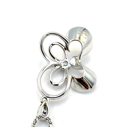 White gold pendant decorated with diamonds, main stone size 0.11 carat, secondary stones total 0.22 7